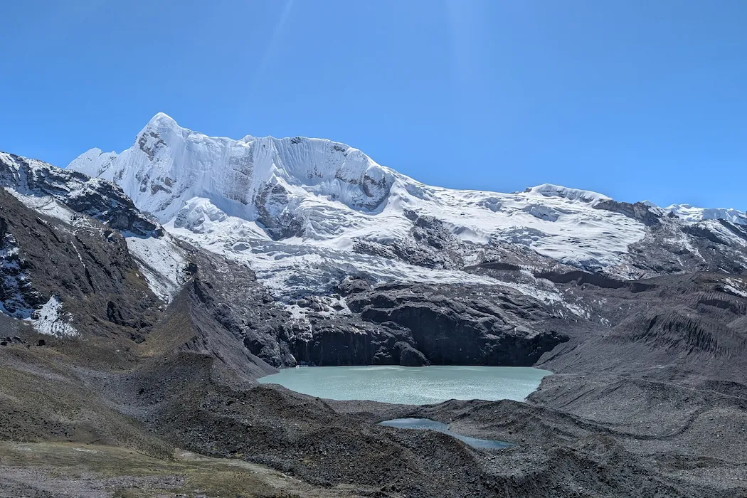 Upis → Arapa Pass → Ausangate Lake — Beneath the glaciers